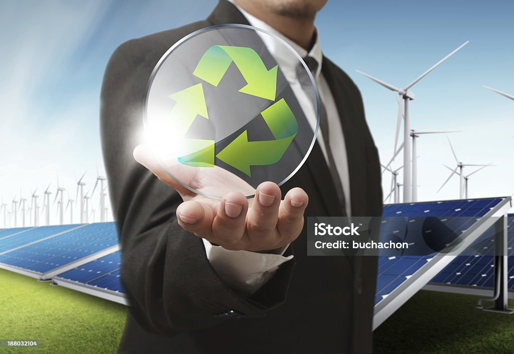 businesss man shows recycle glass shield as concept Backgrounds Stock Photo