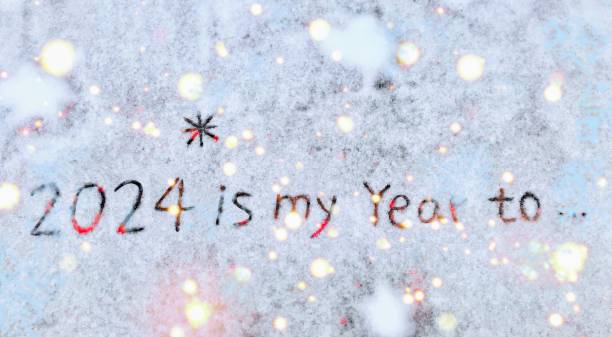 2024 is my year to achieve several goals happy new year 2024 handwriting on fresh snow background with abstract concepts of love and bright future fairbanks photos stock pictures, royalty-free photos & images