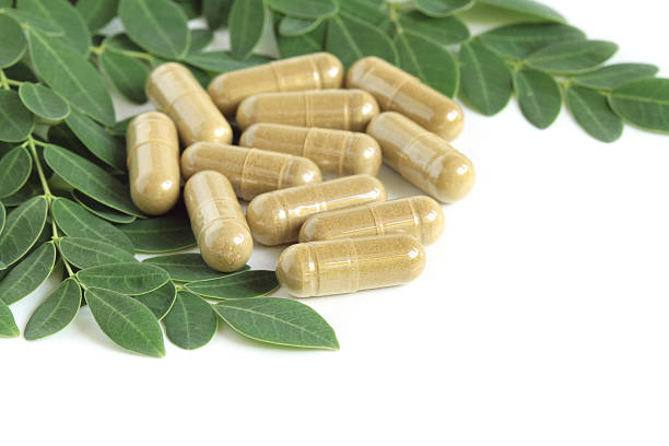 istock Moringa oleifera capsule with green leaves 188037747