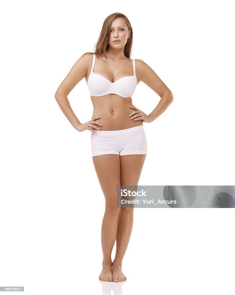 All curves and beauty Full length studio shot of a young model in underwear isolated on white 20-24 Years Stock Photo