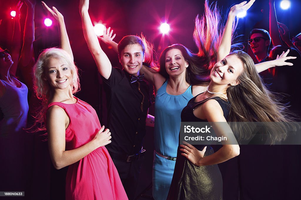 Young people at party. Young people having fun dancing at party. Party - Social Event Stock Photo