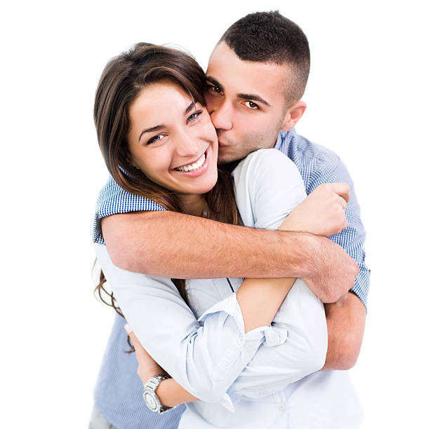 istock Young man kissing his girlfriend 188043586