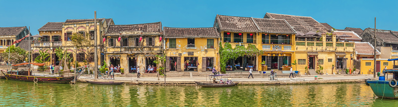 Panorama of traditional Vietnamese buildings along Bach Dang st, Hoi An, Vietnam
