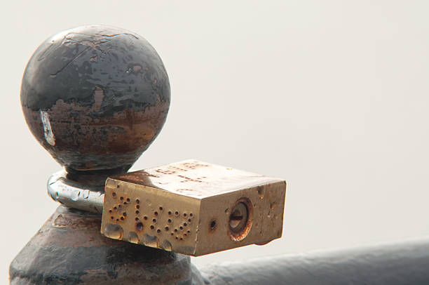 istock clipped a padlock to the bridge 188044305