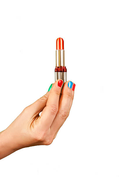 istock Woman hand holding red lipstick 188046975