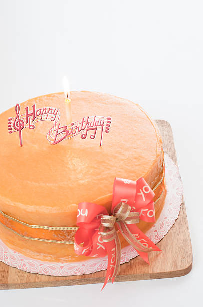 Birthday orange cake stock photo