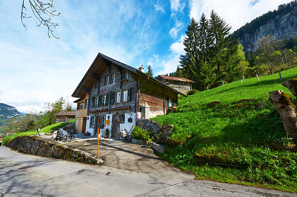 istock Swiss chalet at Alps 188051072