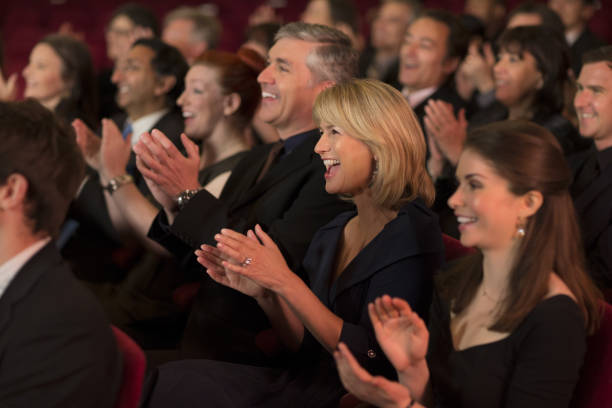 Clapping theater audience  incidental people photos stock pictures, royalty-free photos & images