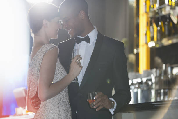istock Well dressed couple hugging in luxury bar 188051746