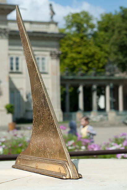 Vertical View of Sundial In Polish Park. stock photo