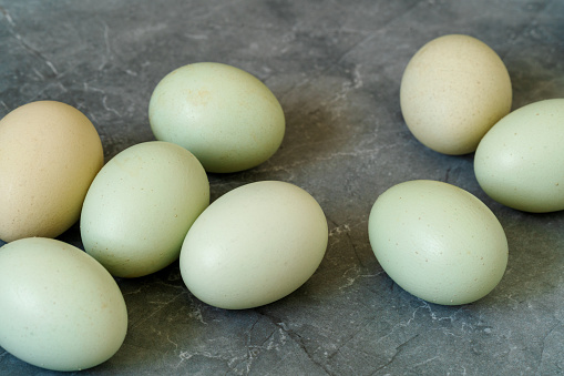 Close up colorful blue eggs on isolated background. Organic and Healthy farm food concept.
