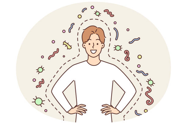 glücklicher mann mit guter immunität, der lächelt und händchen am gürtel hält, der zwischen bakterien und parasiten steht - parasit stock-grafiken, -clipart, -cartoons und -symbole
