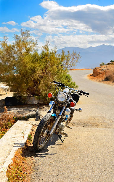 istock old motorcycle parked on the road 188060456