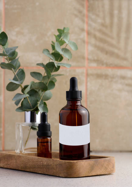 istock Brown glass bottle with white label and pipette, container for cosmetics 1880609803