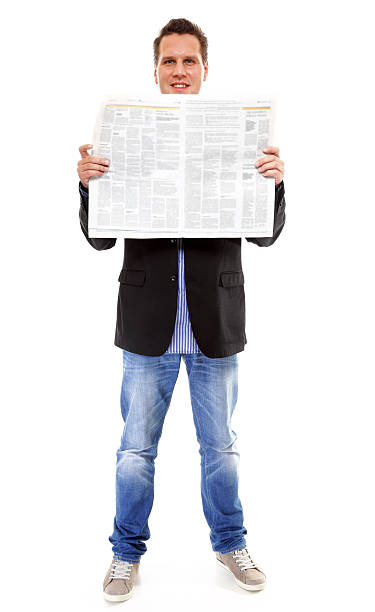 istock Businessman reading a newspaper isolated 188064369