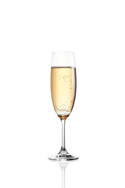 A single filled glass of bubbly champagne Glass of champagne isolated on white background campania photos stock pictures, royalty-free photos & images