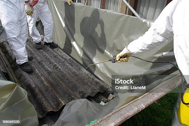 Suited People Applying Asbestos Chemicals Stock Photo - Download Image Now - Asbestos, Removing, Demolishing