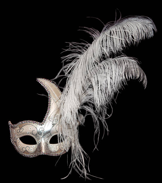 White and gold Venetian mask on black Beautiful white, gold and silver Venetian mask with feathers isolated on black painted masquerade masks stock pictures, royalty-free photos & images
