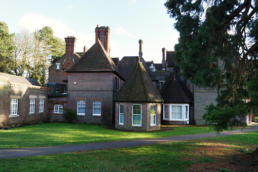 Low Angle View of Beautiful and Historical Wardown Park Museum Building. The Footage Captured on March 17th, 2023 During Cold and Pleasant Weather over Luton, England United Kingdom.