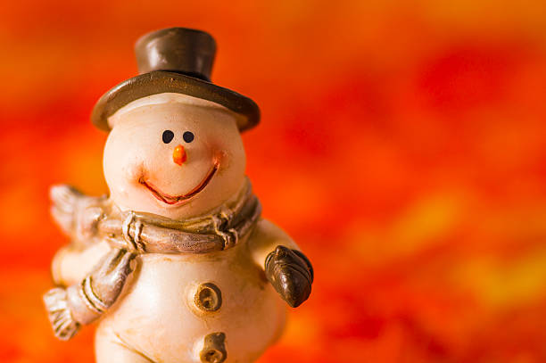 istock Happy snowman on red background 188070758