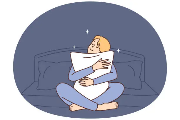 Vector illustration of Happy man sit in bed hug pillow