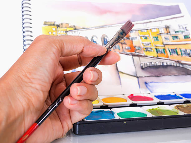 istock hand of designer working with artist equipment 188072614