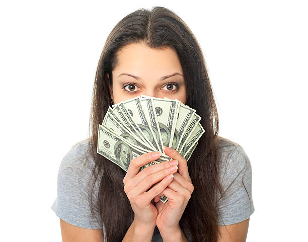 istock Young woman holding a dollar bills 188072686
