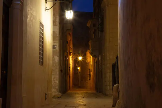 Ancient narrow medieval street, night, Mdina, Malta