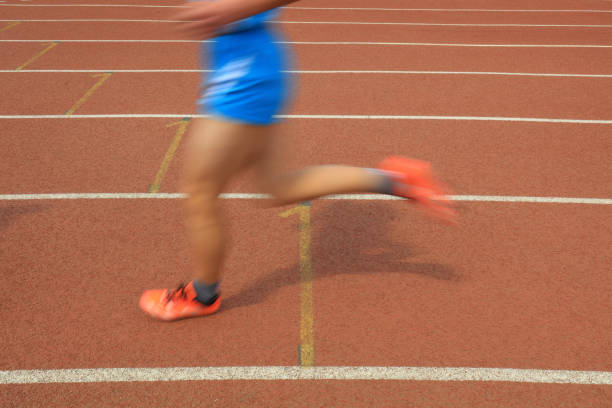 istock Long distance runners are running on the track 1880755104