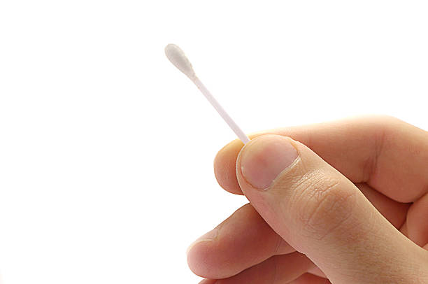 istock Cotton Stick in hand on white background 188076047