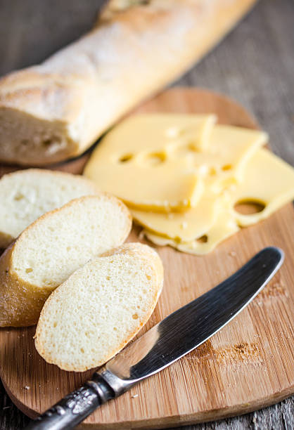 istock Sliced french baguette and cheese 188076587
