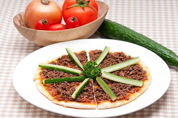 istock Turkish beef pizza with cucumber on top 188076940