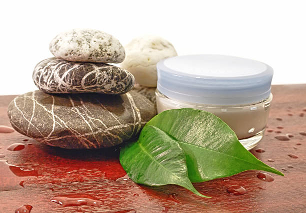 istock Spa stones and cosmetic cream 188077138