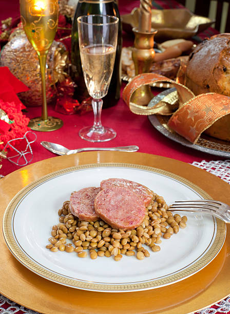 Slices of pig trotter with lentils over christmas table Slices of pig trotter with lentils over christmas table. hedgehog mushroom stock pictures, royalty-free photos & images