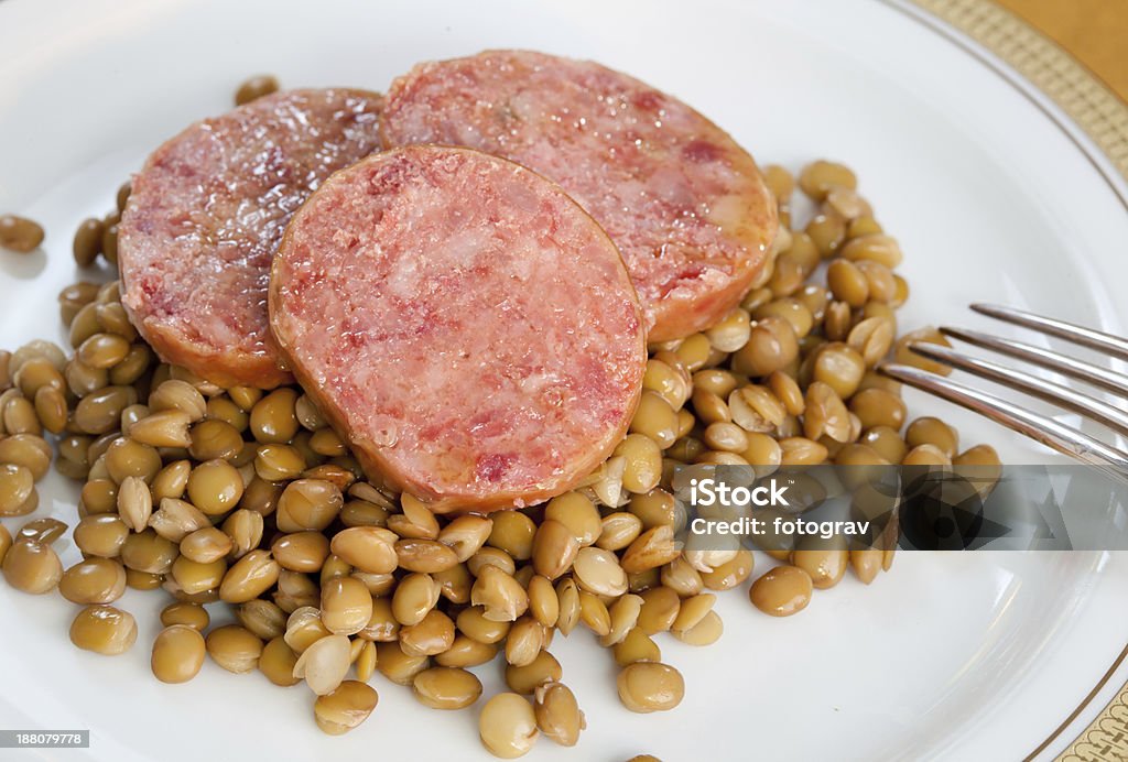 Pig trotter with lentils, traditional italian food Pig trotter with lentils, traditional italian food. Animal Body Part Stock Photo