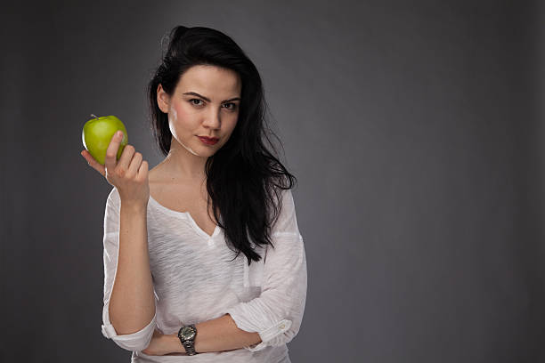 istock Fit girl holding apple 188081408