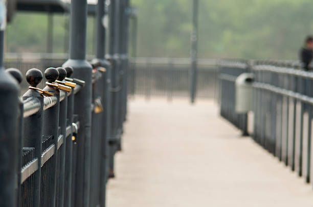 clipped a padlock to the bridge