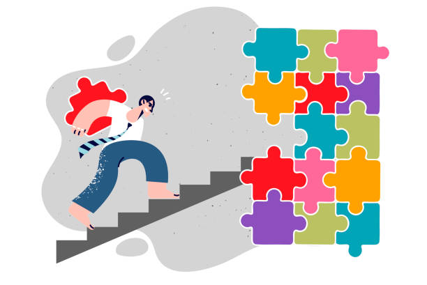 istock Businessman diligently assembling puzzle, for concept building company or department in corporation 1880827424