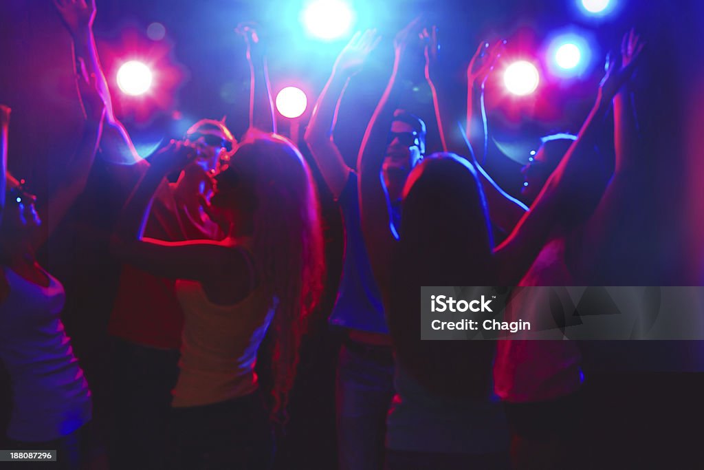 Young people at party. Young people having fun dancing at party. Party - Social Event Stock Photo
