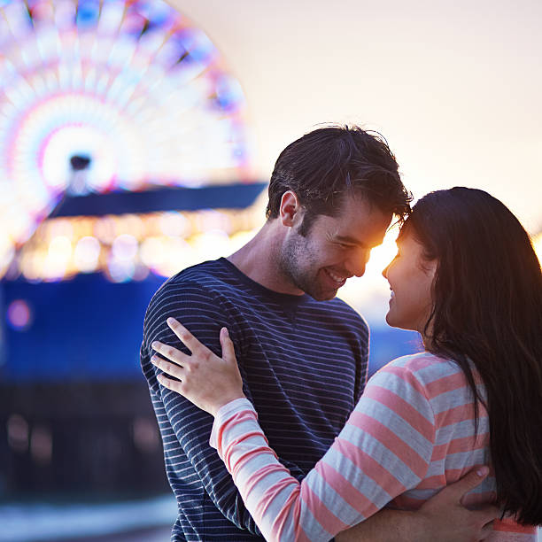 istock romantic couple near santa monica pier 188090989