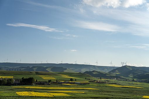 Agricultural land on the plateau and wind power in the mountains