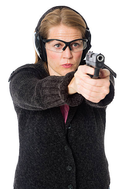 istock Woman Pointing a Gun on White Background 188093619