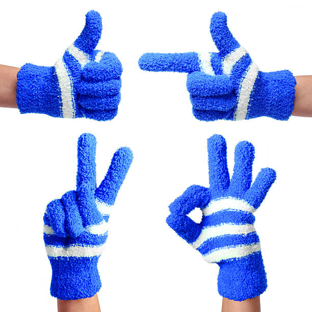 istock Set of Hands in Knitted Blue Gloves isolated 188094411