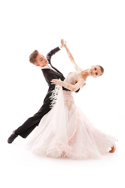 istock Two children in ballroom clothes waltzing 188095016