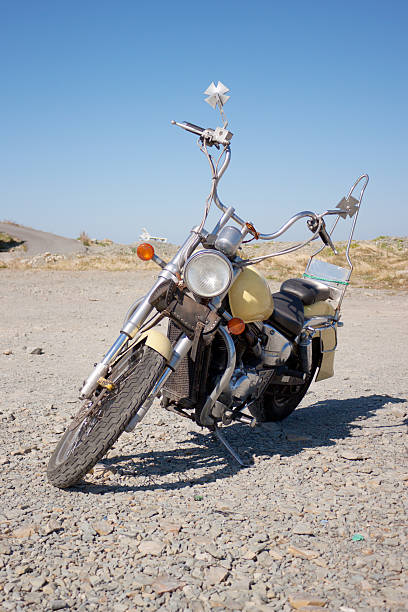 istock Old motorcycle is in a vacant lot autumn day 188099716