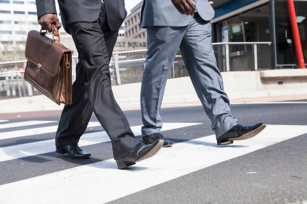 istock Two african businessmen crossing the road 188105501