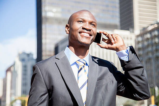 istock African businessman on the phone ready to commute 188105527