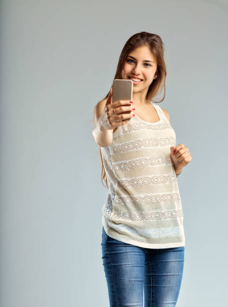 istock Smartphone captures her joyful, chic moment 1881092777