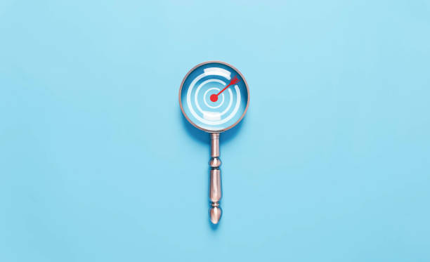 istock target icon in magnifying glass 1881115348