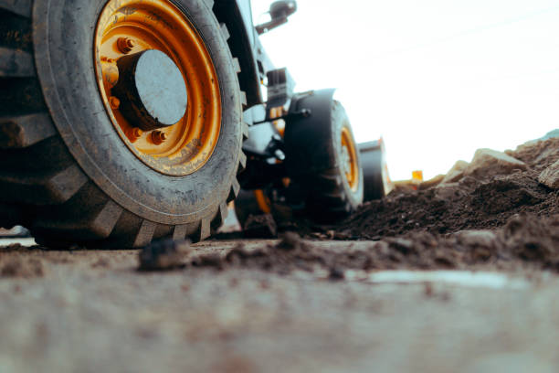 istock Wheels of an Excavator on a Construction site at Work 1881153143